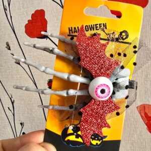 Hebillas Para Pelo Mano Esqueleto con Ojos. Mide 10 cm. Halloween